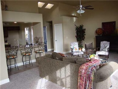 Living Room. Great view of the vaulted ceilings w/