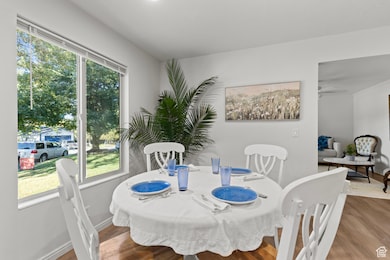 Dining space featuring wood finished floors