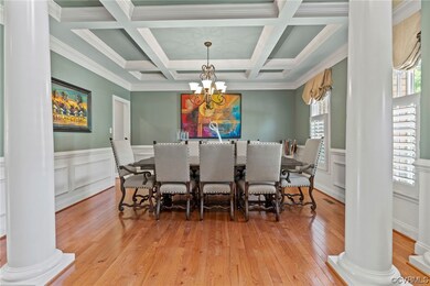 Gorgeous Dining Room with coffered ceiling and har