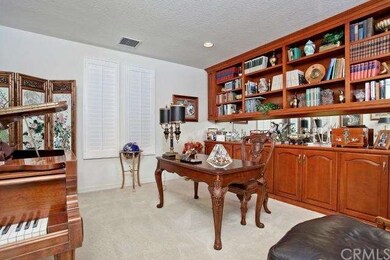 Large Beautiful Den With Custom Bookcases
