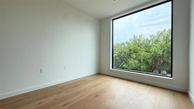 Unfurnished room featuring light wood-type floori