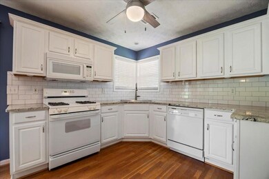 Granite countertops with white cabinets!