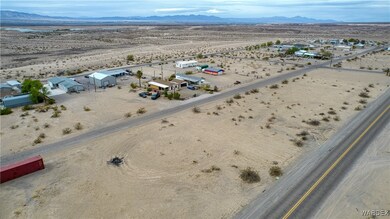 Drone / aerial view with a mountain view, a desert view, and a rural view