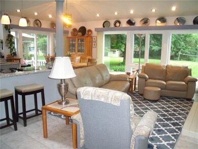 Family room with gas stove, eating area and kitche