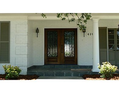 Photo. Custom Iron and Wood Doors