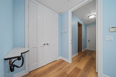 Corridor with light hardwood / wood-style floors