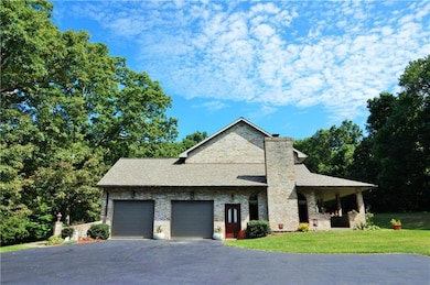 Large 2 stall garage with plenty of parking area!