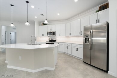 Kitchen featuring crown molding, visible vents, de
