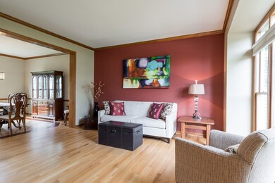 Gleaming Hardwood Floors and Crown Molding