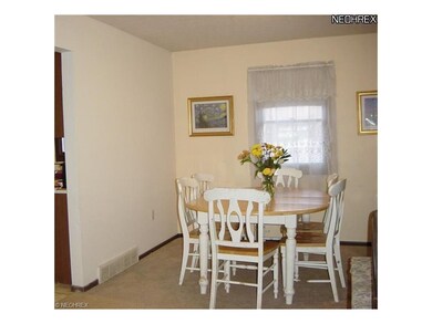 Just off the kitchen is the dining room, also open