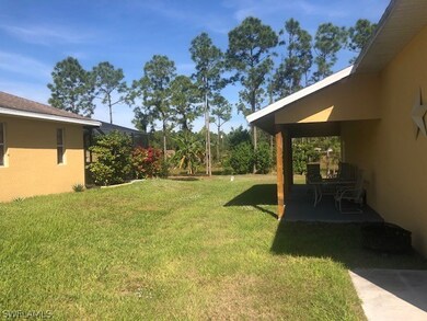 124 Greenbriar Blvd, Lehigh Acres, FL 33972 - photo 2