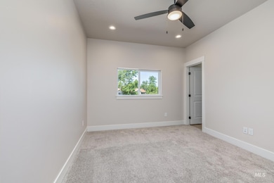 Unfurnished room with light carpet, recessed lighting, and ceiling fan