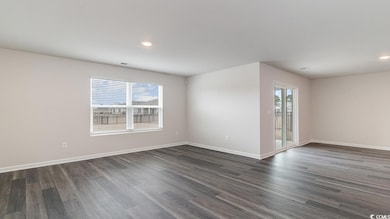 Unfurnished room featuring dark hardwood / wood-st