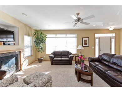 Great room with marble surround cozy gas fireplace