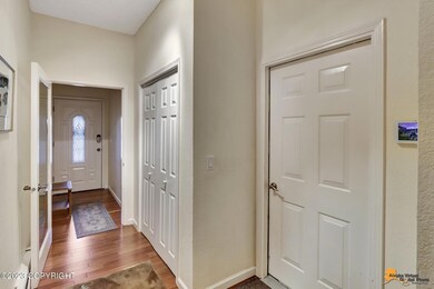 Entry door to the garage on the right