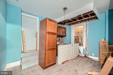 1110 N Dukeland St, Baltimore, MD 21216 - photo 5
