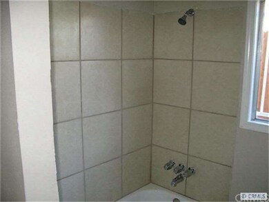 Newly tiled shower surround and tile floor