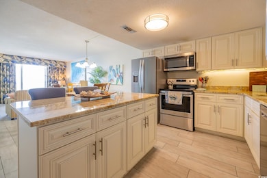 Kitchen featuring appliances with stainless steel 