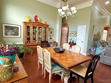Dining room with view of kitchen entry and hall le