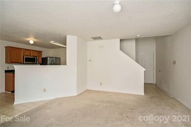 Living room with view to the kitchen