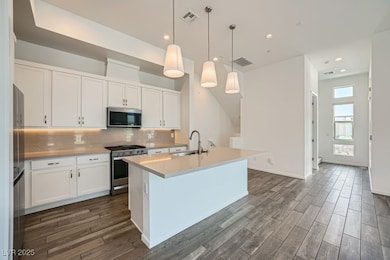 Kitchen featuring appliances with stainless steel