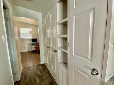 Pantry adjacent to kitchen