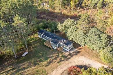 10037 W Colby Rd, Gowen, MI 49326 - photo 2