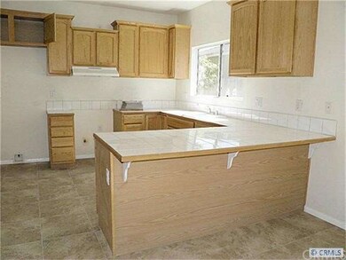 Kitchen with new tile floor