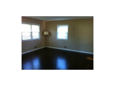 Beautiful wood floors in the living room and bedro