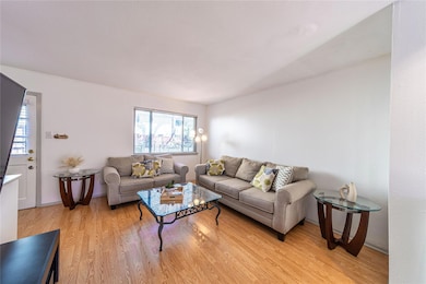 Living area with light wood-style flooring