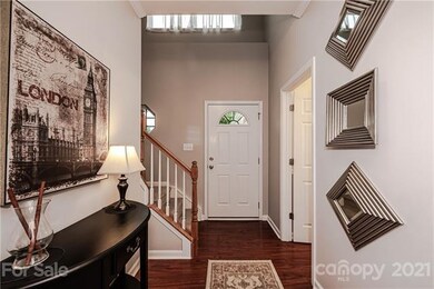 Two story foyer with plentiful natural light!