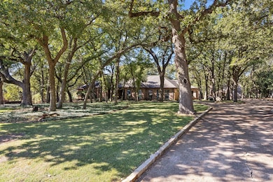 Plenty of parking areas, 2 car garage and circle drive