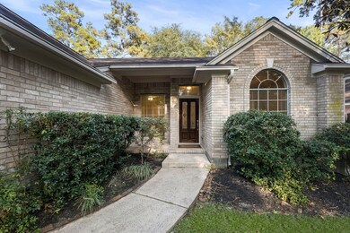 A welcoming entrance to the home offers solid wood door with lead glass.