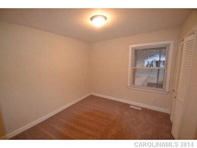 Bedroom - New carpet and freshly painted in two to