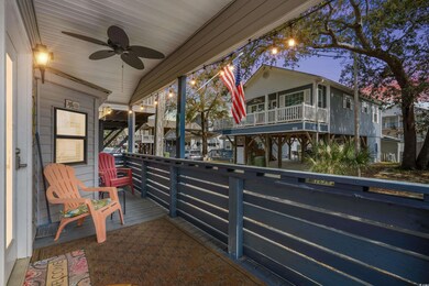 Balcony at dusk featuring ceiling fan