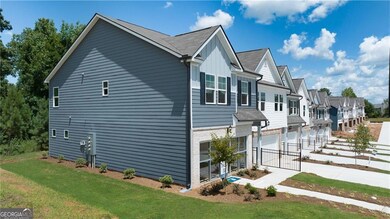 View of home's exterior with an attached garage, a