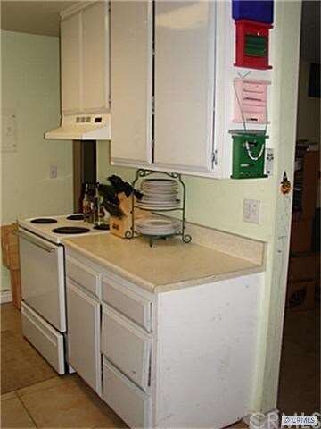 Kitchen features Ceramic Tile Flooring
