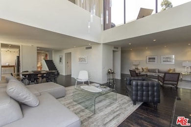 Living looking toward Den and Entry Hall/Kitchen