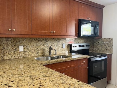 Boca Teeca III unit 123, Boca Raton, FL 33487 - photo 3