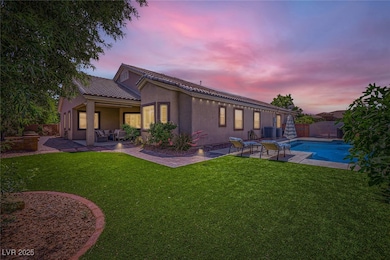 Rear view of property with a patio area, central a