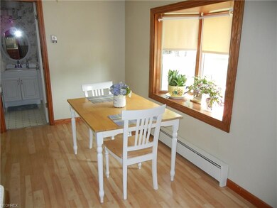 Dinette area with bay window and looking into Full