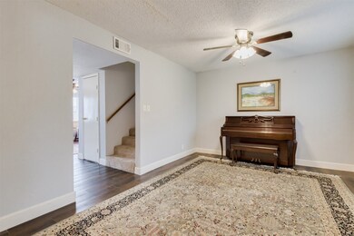 Another view of the living room with the corridor