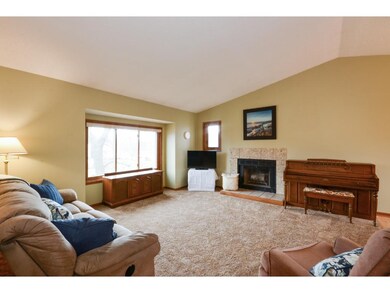 Living Room features open floor plan with vaulted 