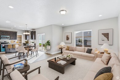 Living room featuring recessed lighting and a chandelier