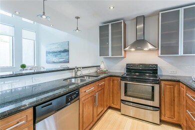 The horseshoe layout of the kitchen allows for max