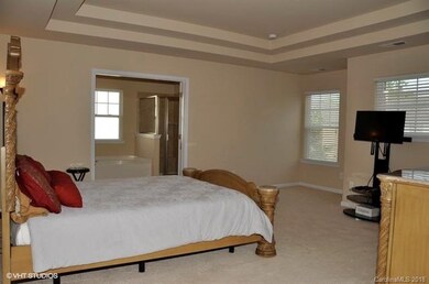 Master bedroom also features double doors entering