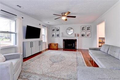 Cozy up with a fire in this spacious living room!