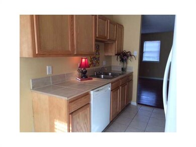 Kitchen. COUNTERTOPS EXTENDED TO ACCOMODATE DISHWA