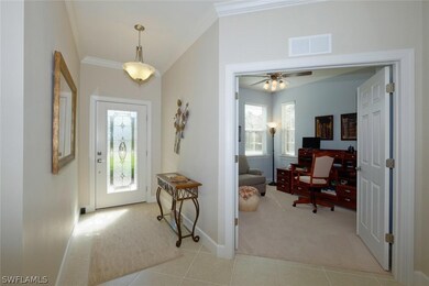 Foyer and 2nd bedroom/office.