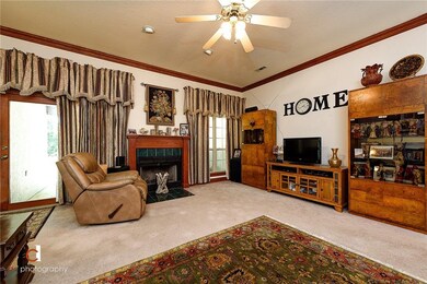 living room with gas starter fireplace and patio d